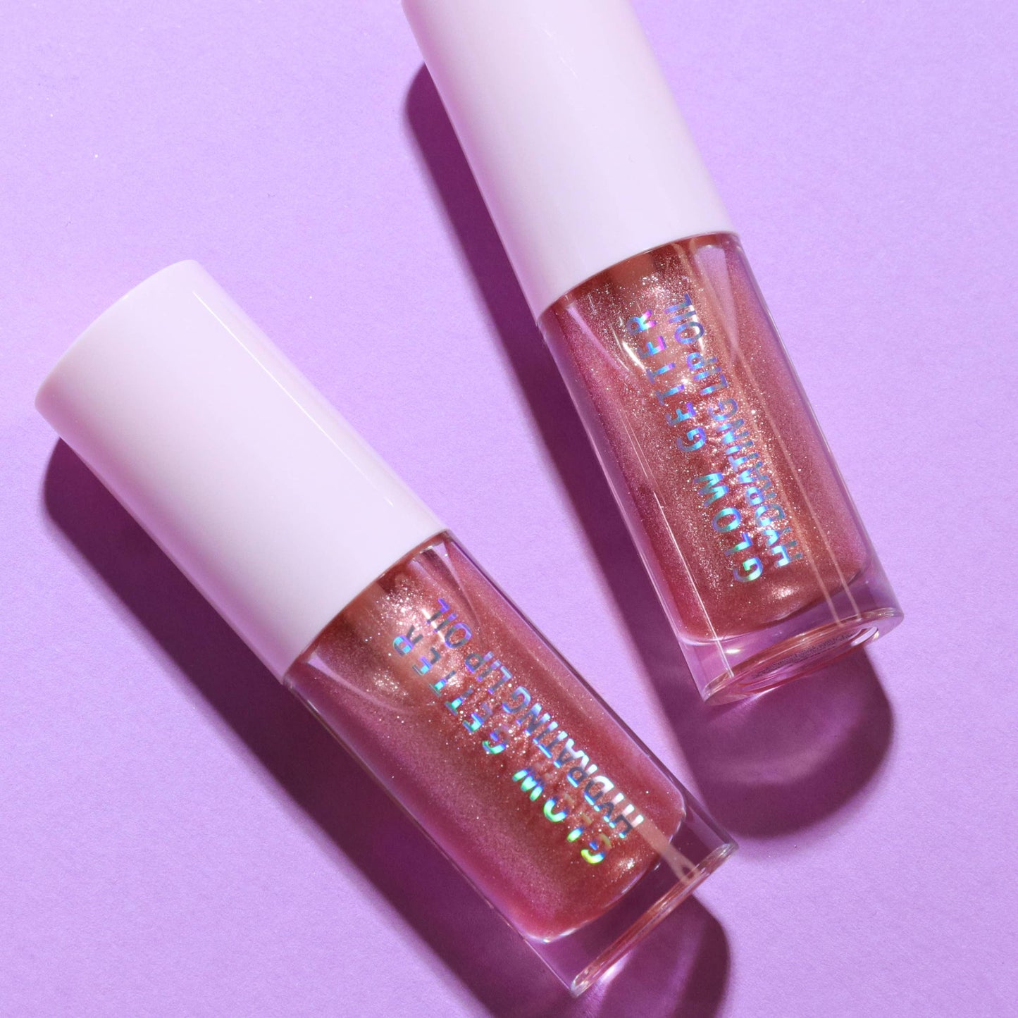 Glow Getter feuchtigkeitsspendendes Lippenöl (004 Tickled Pink)