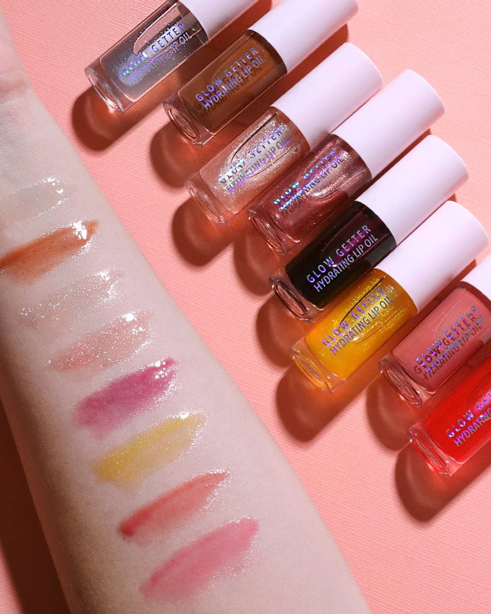 Glow Getter feuchtigkeitsspendendes Lippenöl (003 Champagne Kiss)